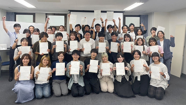 低学年次から社会人との接点を創出し　学生の視野拡大と対話力向上を実現させる─明治大学